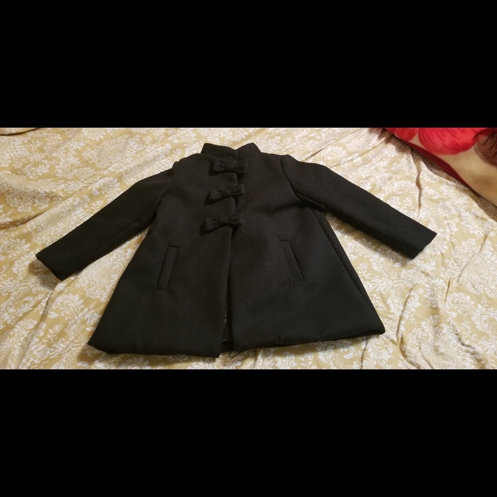 Black peacoat with bows